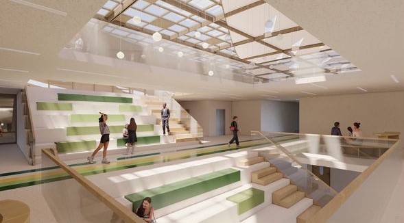 Harmony School's central atrium: light-filled, tiered gathering space.