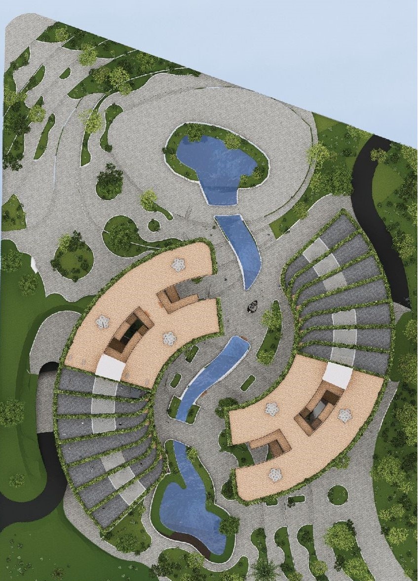 Aerial view showcasing water features and curved building layout.