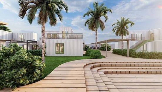Container housing with palm trees and wooden pathways.