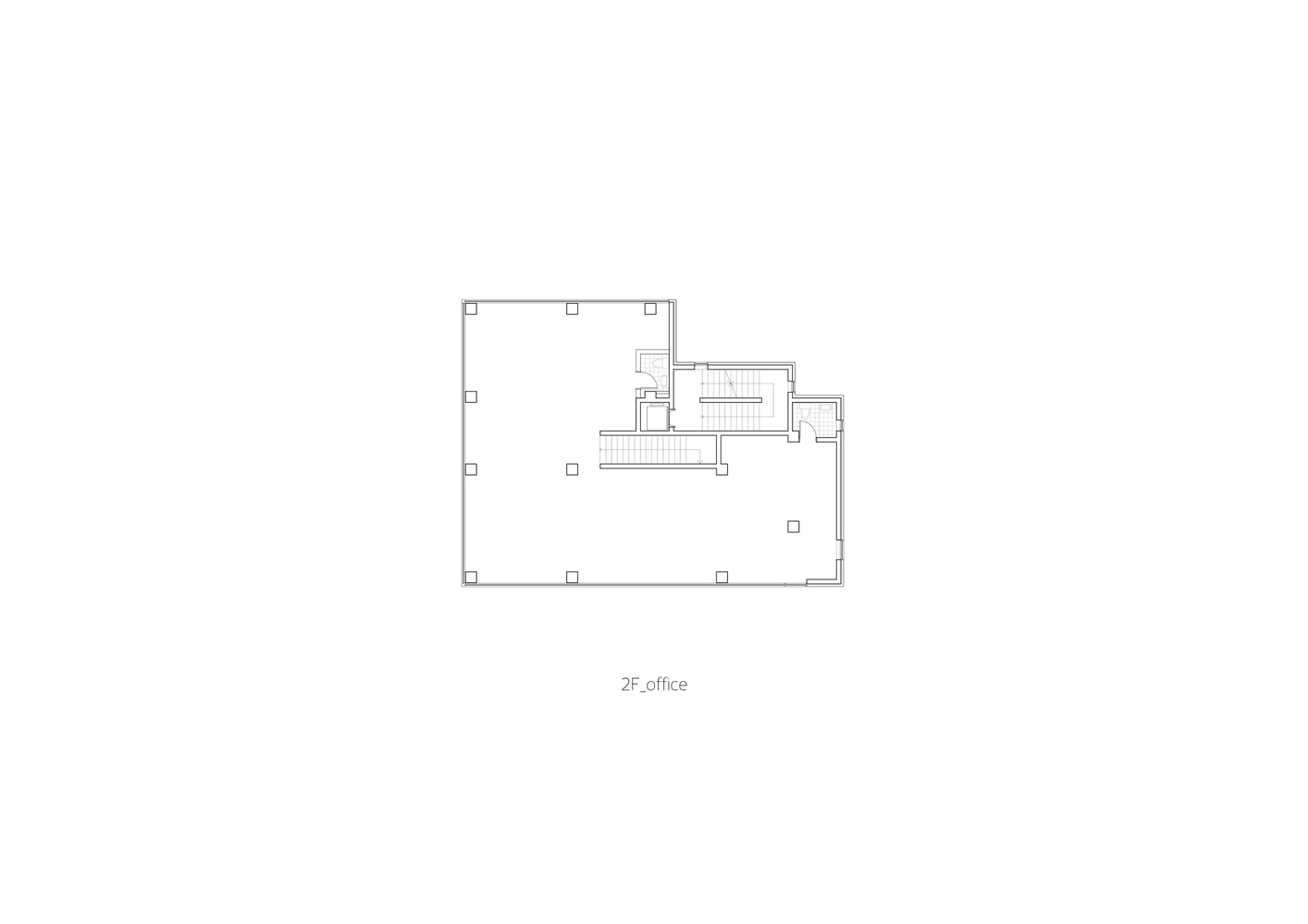 Floor plan drawing of the office level showing open workspace and a service core with stairs