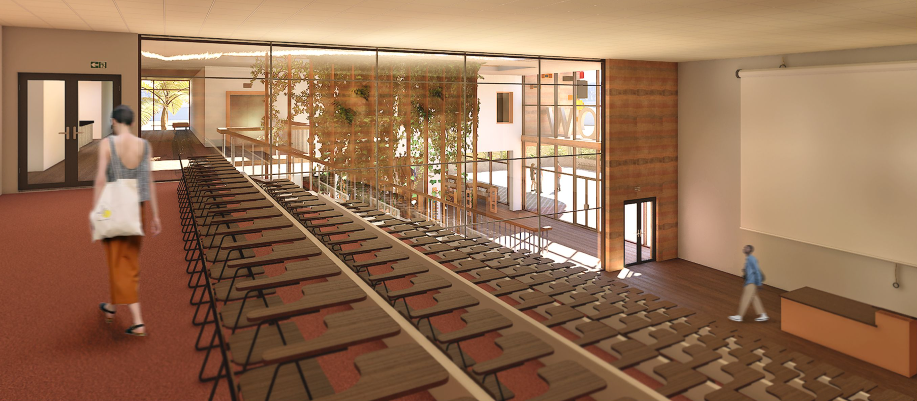 A spacious auditorium inside the iKnow Library, designed for lectures, film screenings, and community events.