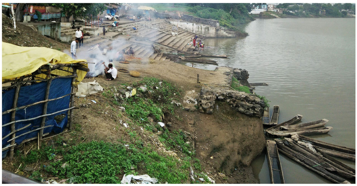 A vibrant space where traditional practices, riverside activities, and cultural interactions blend seamlessly.