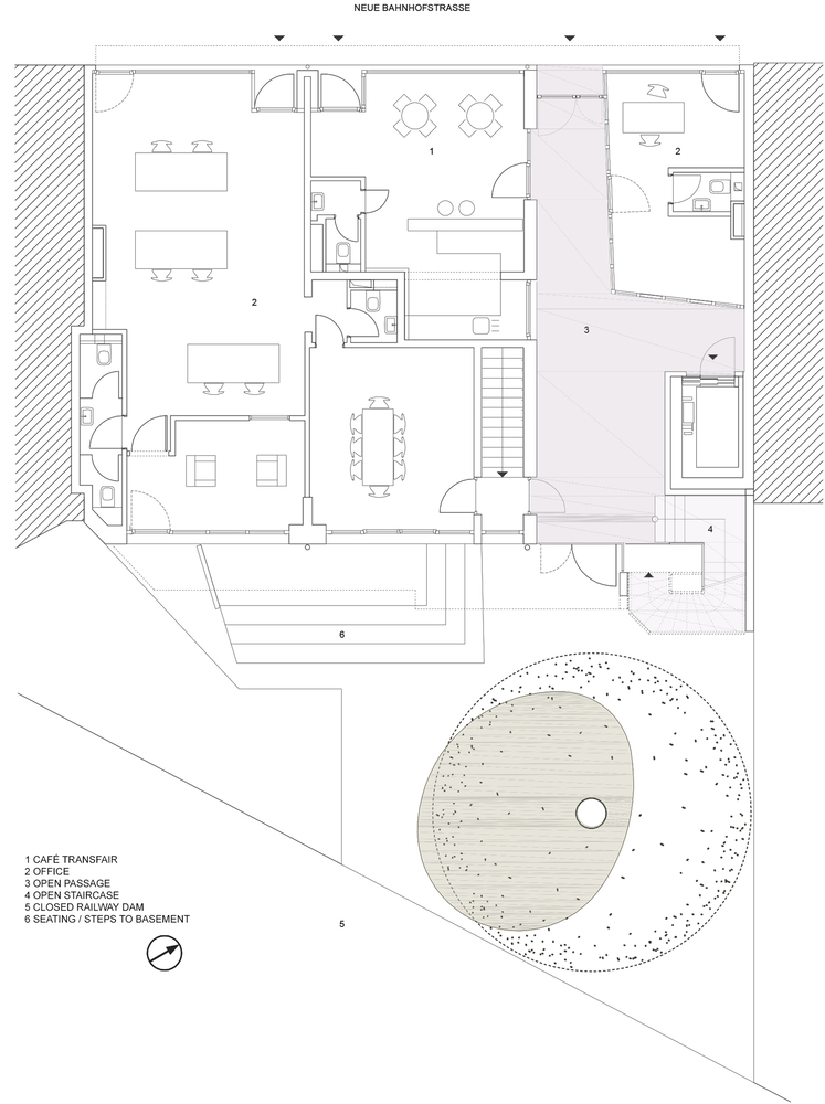 Floor plan drawing showing apartment layout with circular courtyard and timber decking at lower right