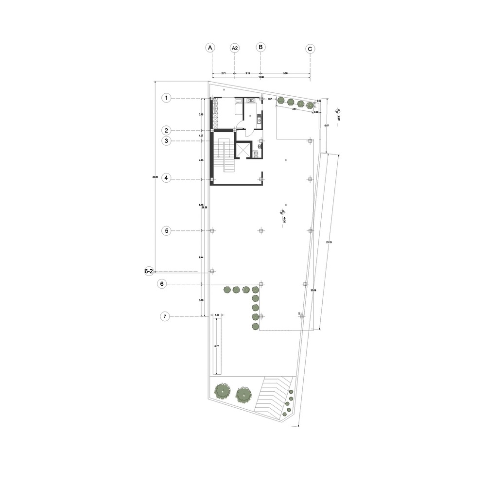 First floor plan drawing showing upper level rooms with a rooftop terrace and planted areas