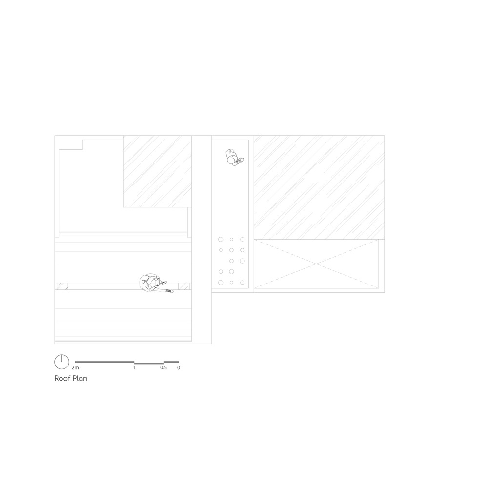 Roof plan drawing showing hatched surface areas and a narrow circulation spine with planting