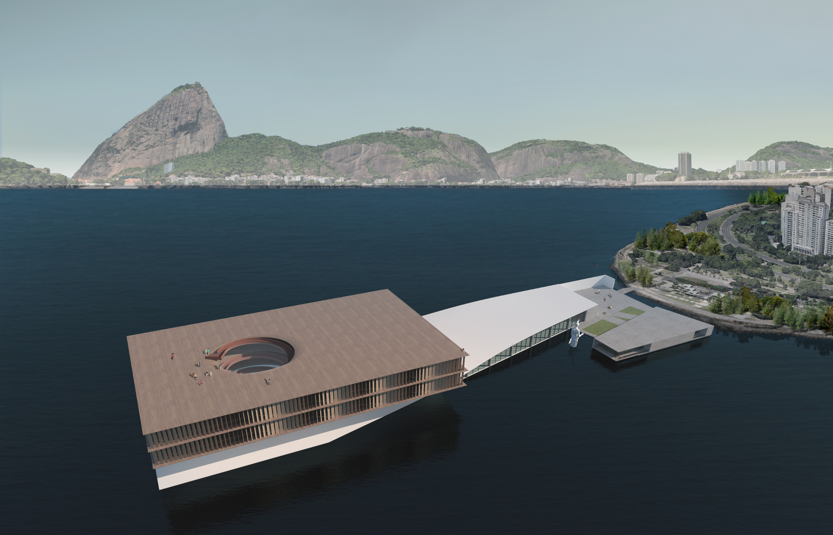 Closer view of the museum’s contemporary design, with glass curtain walls reflecting the ocean’s serenity.