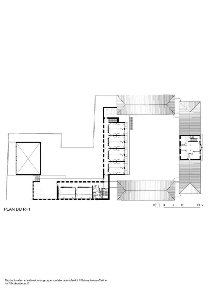 First floor plan: upper classrooms along the gallery walkway, gymnasium double-height roof, rooftop terrace