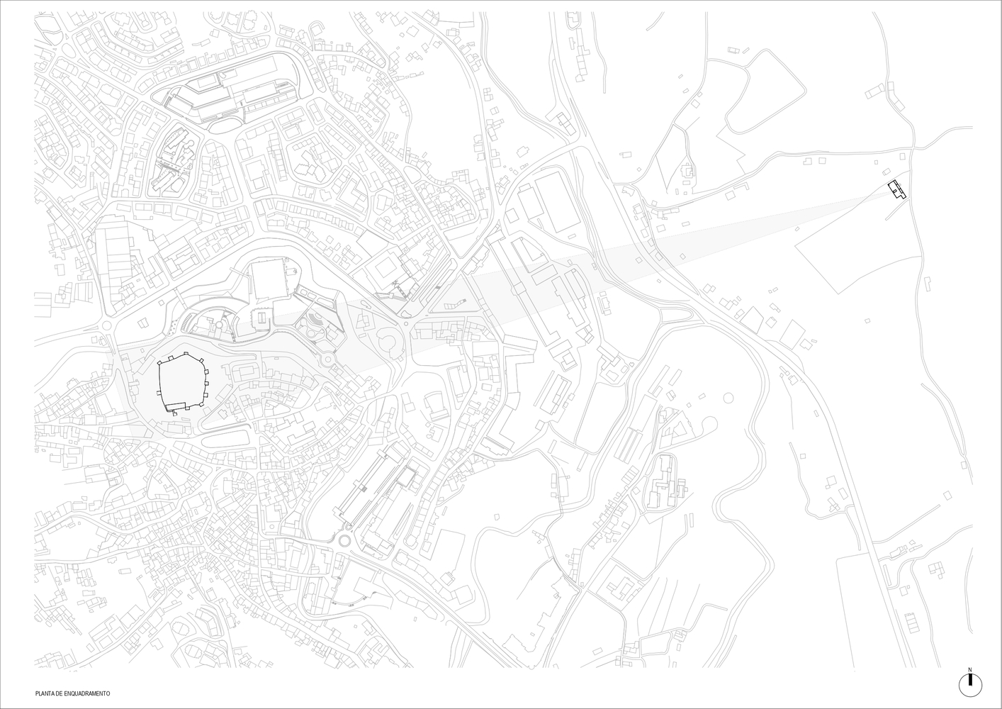 Site plan drawing showing urban street network and building footprints with topographic contours