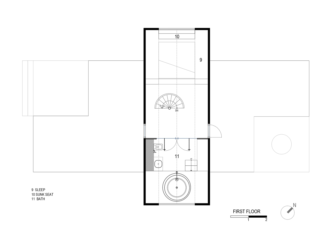 First floor plan drawing showing a narrow volume with spiral stair, bathroom, and circular tub