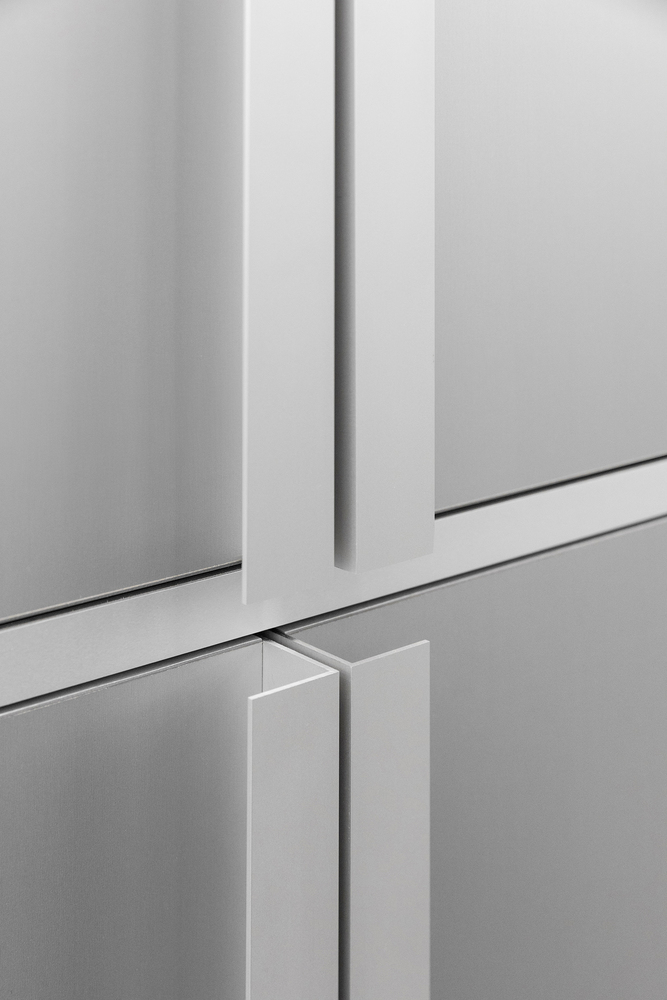 Detail: aluminium shelving profile junction, precise meeting of vertical and horizontal members