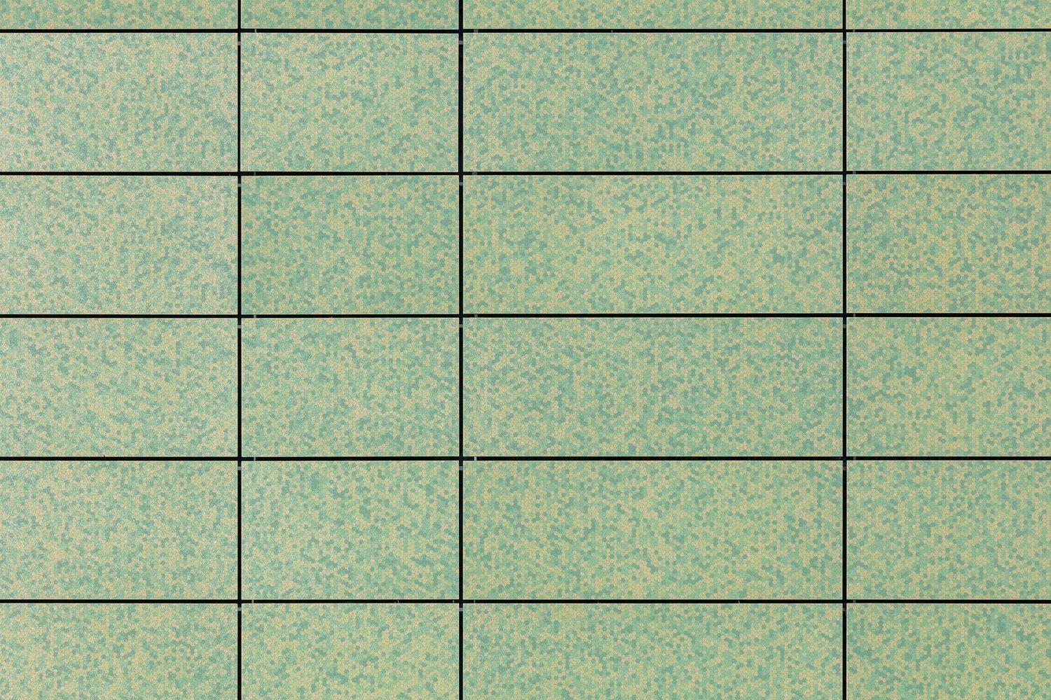 Grid of rectangular panels with mottled green and beige finish showing horizontal joint lines