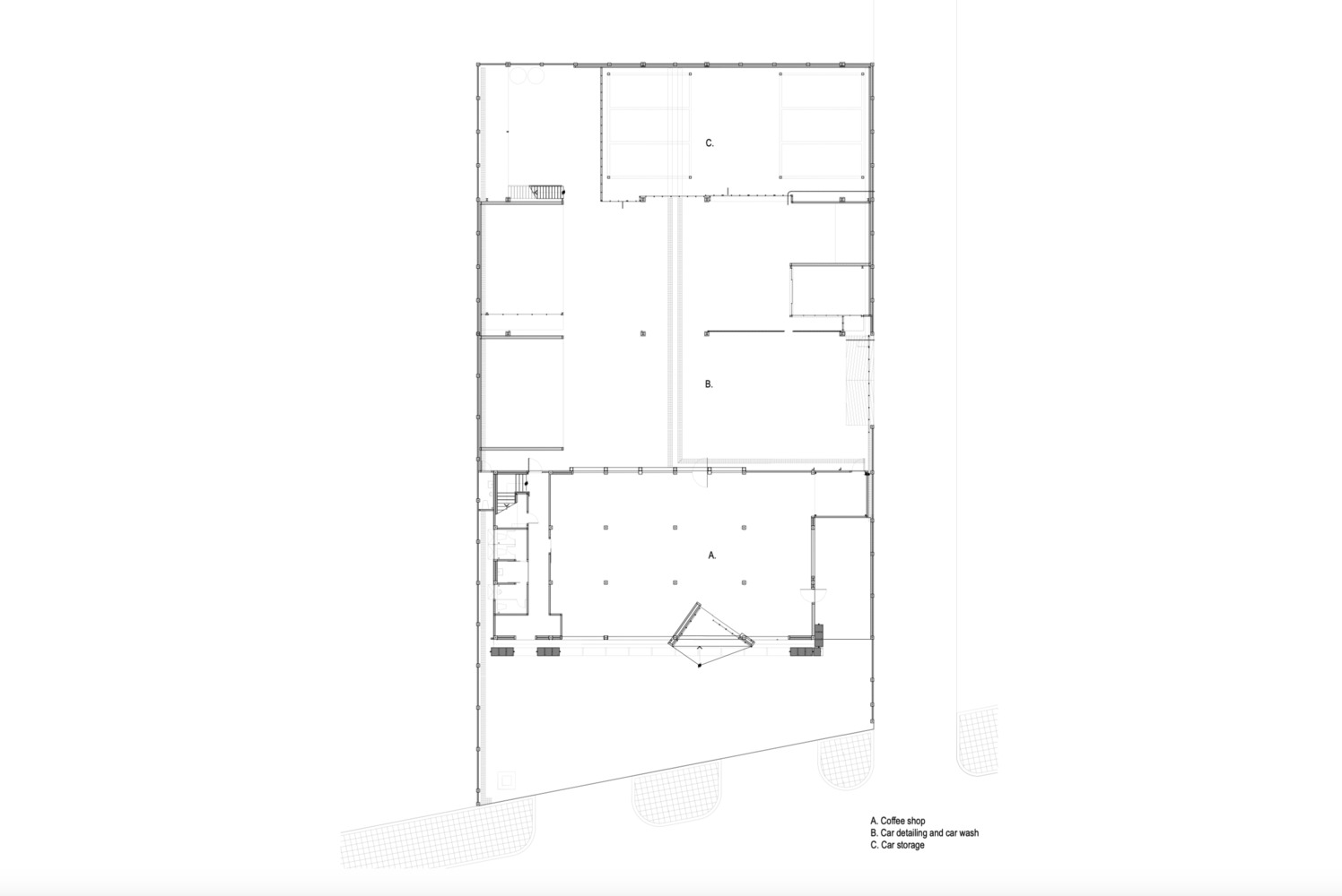 Ground floor plan drawing indicating open interior spaces and a diagonal circulation element