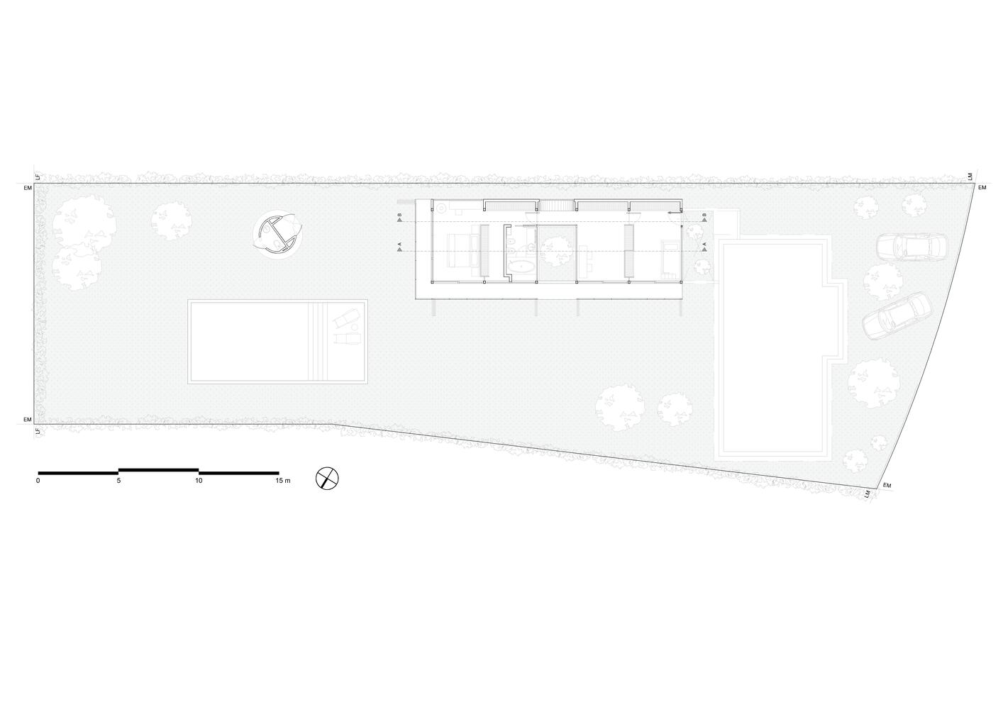 Site plan drawing showing a linear building footprint on a tapered lot with pool