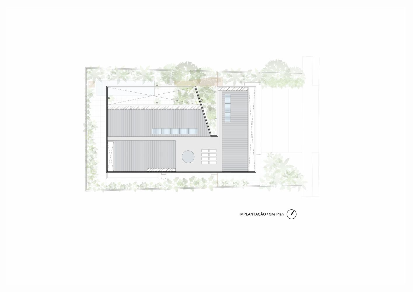 Site plan drawing showing rectangular building footprint with pool and surrounding vegetation