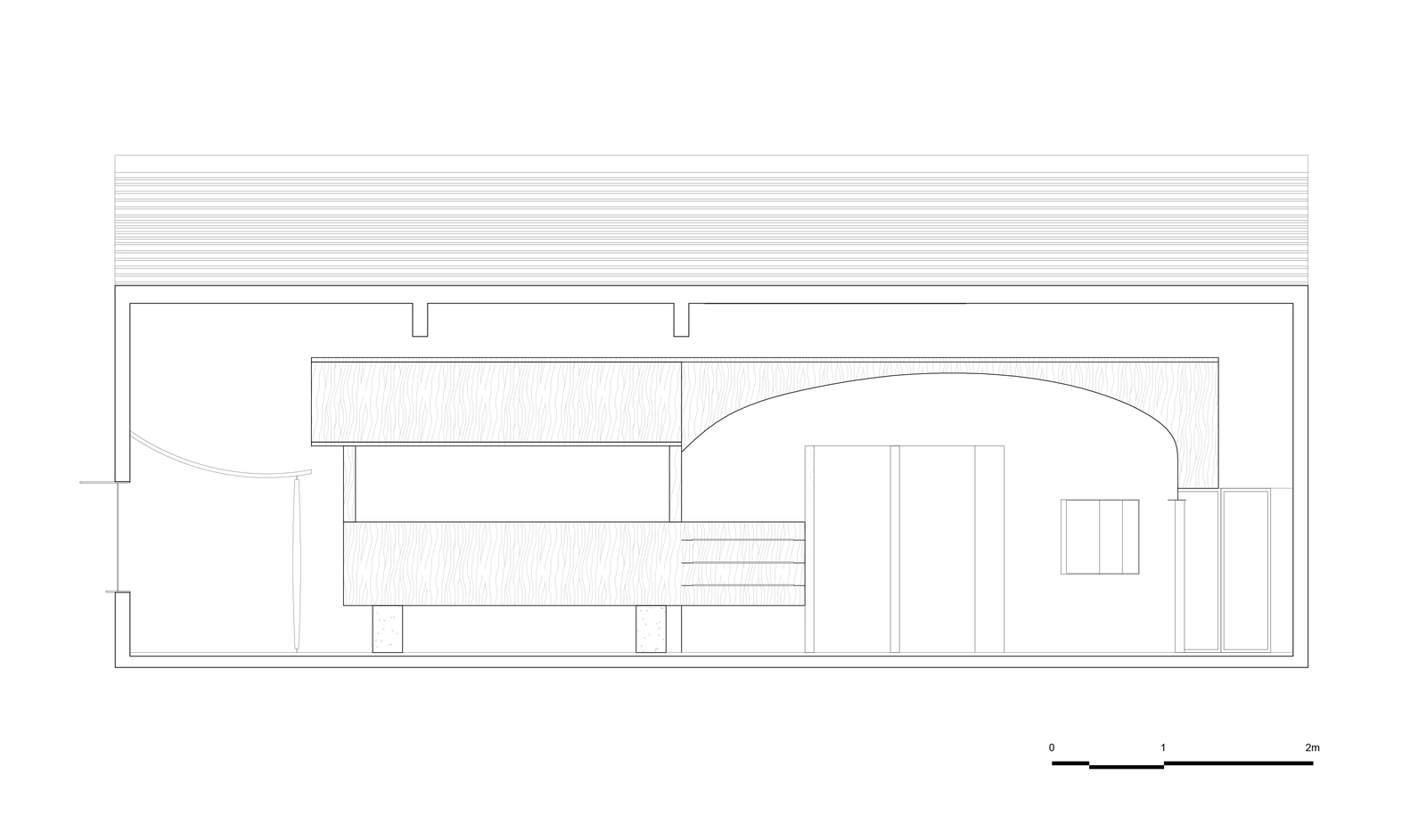 Section drawing showing interior spaces with a curved ceiling vault and staircase