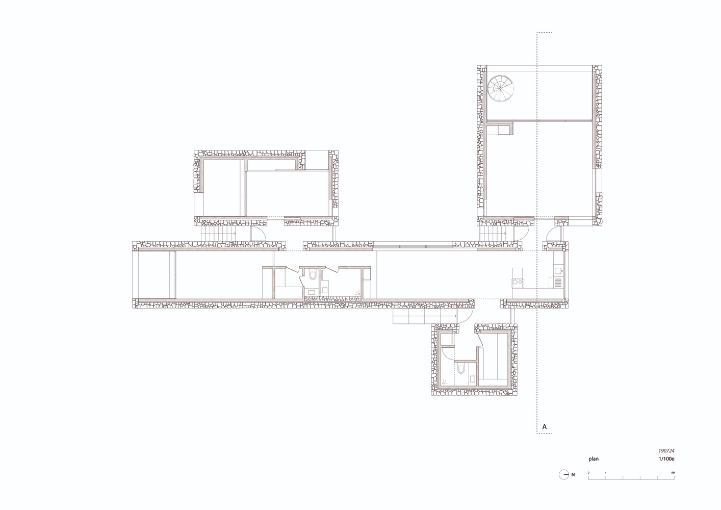 Floor plan drawing showing four pavilions connected by a linear corridor on sloping terrain