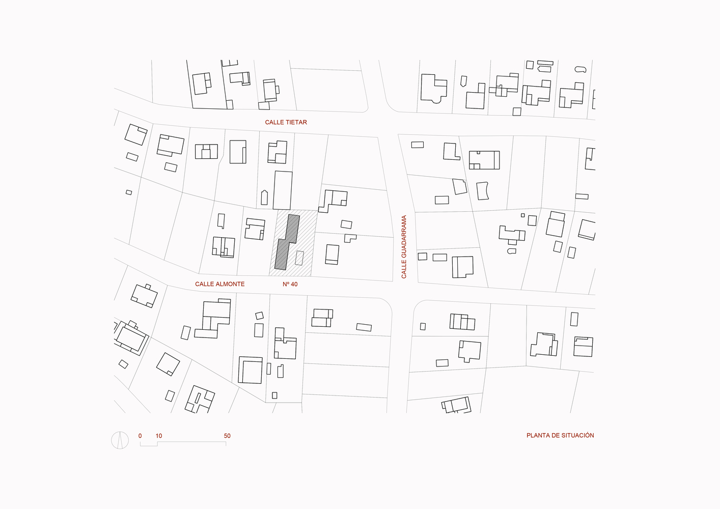 Site plan drawing showing the building footprint among surrounding structures on irregular blocks