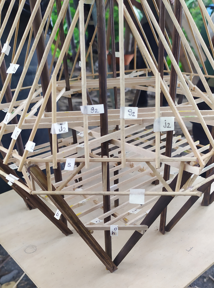 Close-up view of the labeled timber joinery and floor framing within the pentagonal structural model