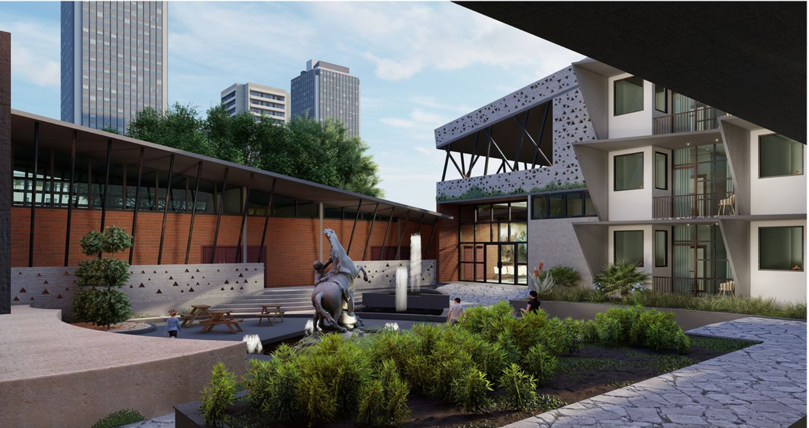 Central courtyard with a bronze sculpture, planted beds, and perforated bridge overhead