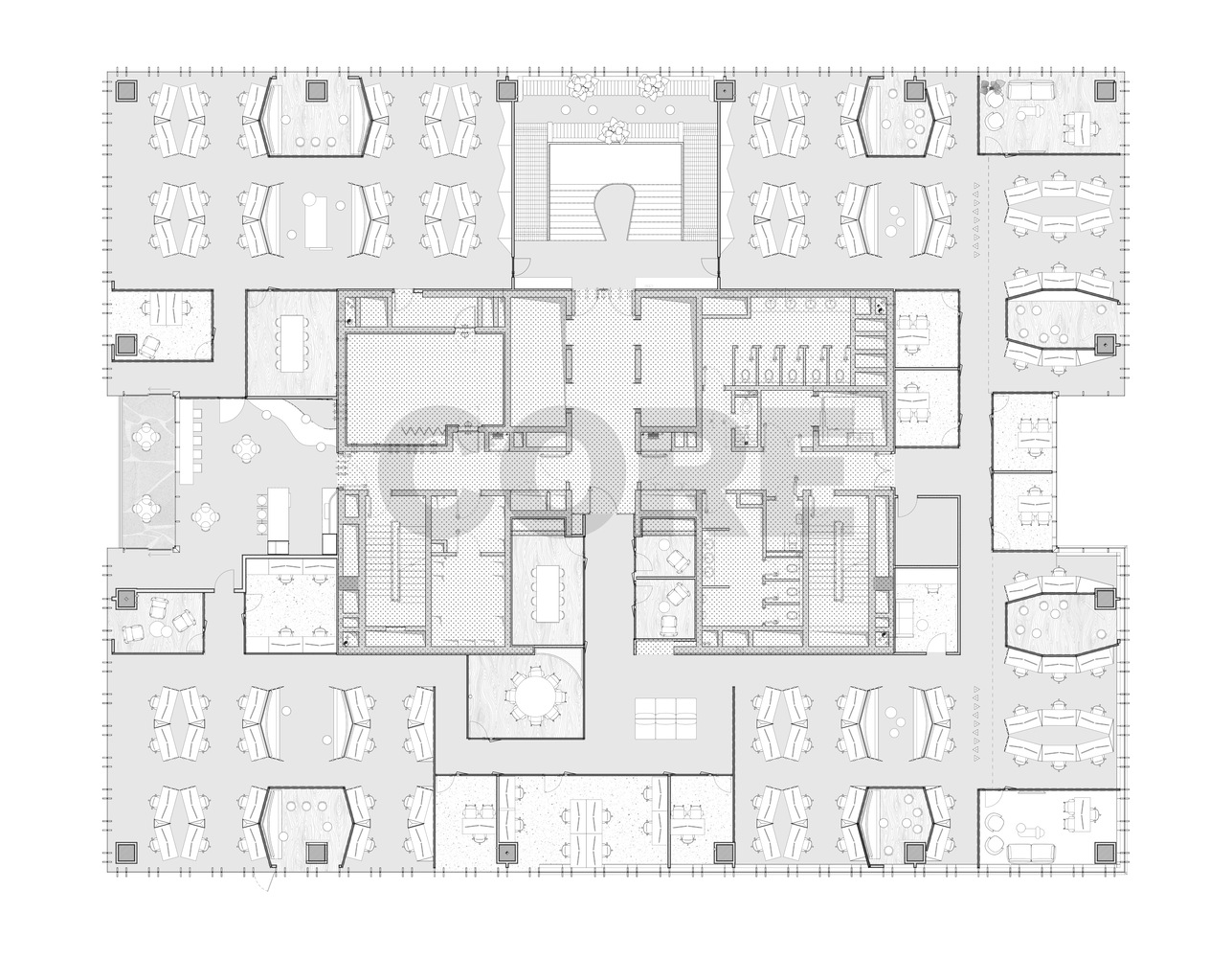 Floor plan drawing showing open office areas surrounding a central core with staircase and support spaces distributed throughout