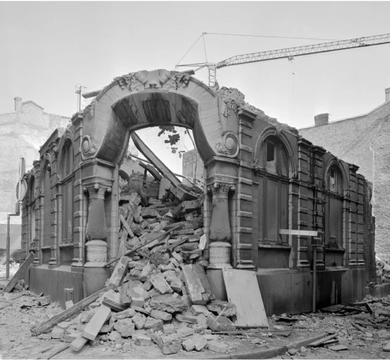 A historical structure captured mid-demolition, symbolizing the loss of Stockholm's architectural heritage.