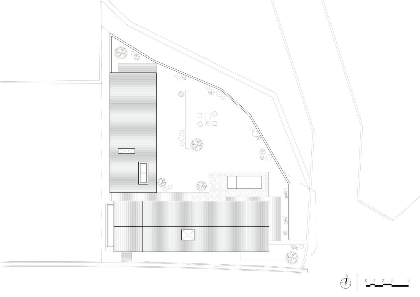 Roof plan drawing depicting the corrugated metal roof volumes and outdoor courtyard spaces