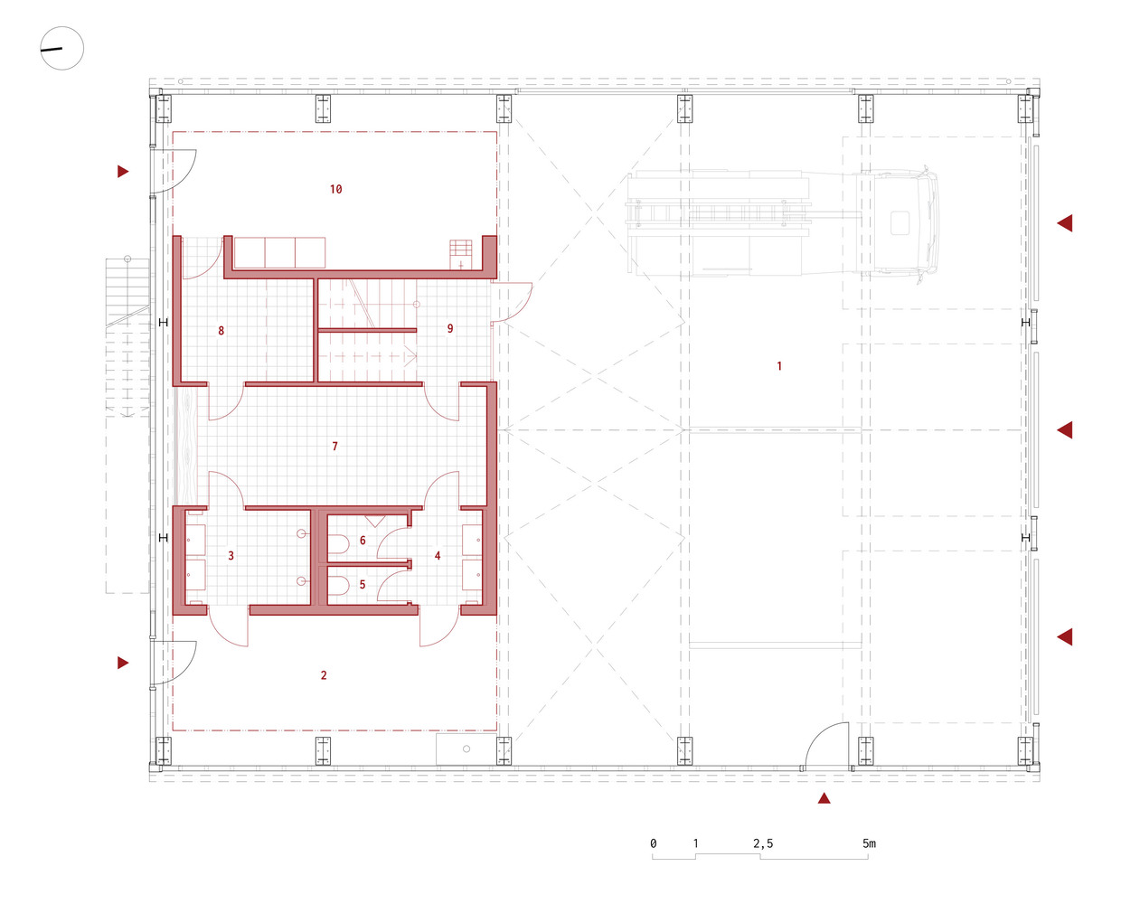 Floor plan drawing showing a compact residential unit and large adjacent hall with gridded structural columns
