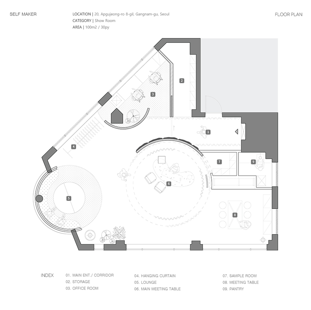 Floor plan drawing showing showroom with curved walls and circular lounge space