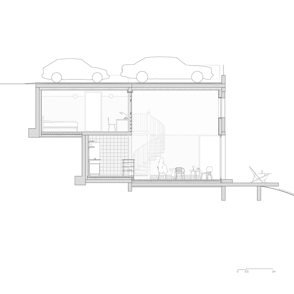 Section drawing showing two-story residence with rooftop parking and interior staircase
