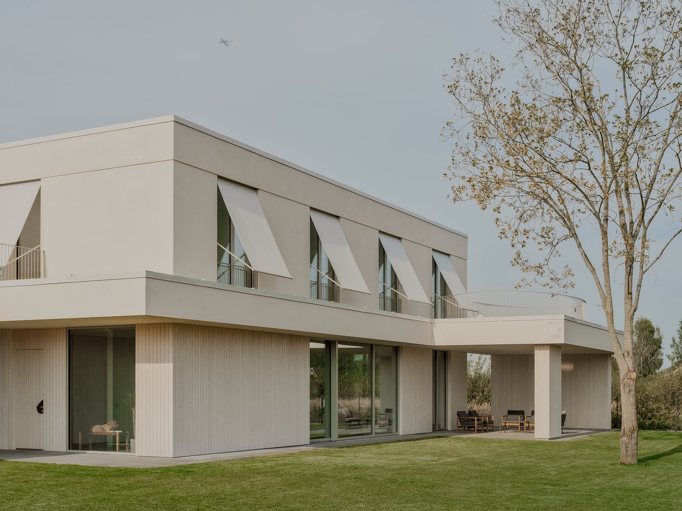 Lime and Timber House by GAISS in Latvia: Nordic craftsmanship where natural materials age gracefully in a northern landscape