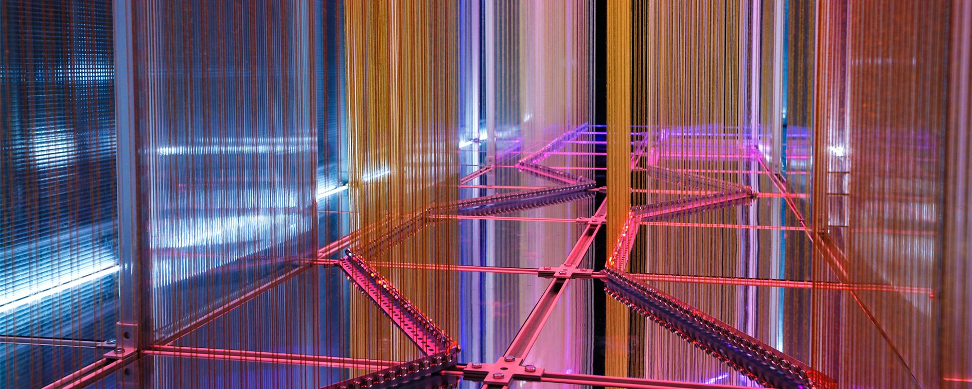 A vibrant interplay of colors and structure, where light transforms the architecture into an ever-changing, immersive experience.