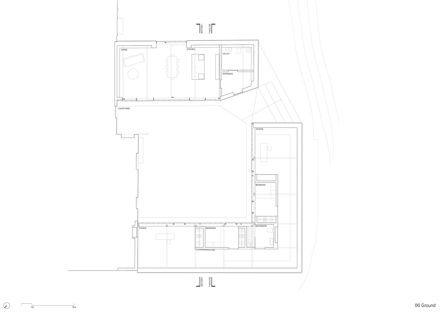Ground floor plan drawing showing two connected volumes forming an L-shaped courtyard arrangement