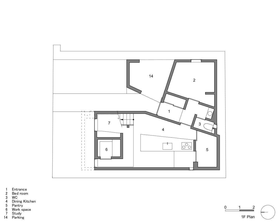 First floor plan drawing showing angled walls organizing entrance, bedroom, kitchen and central courtyard