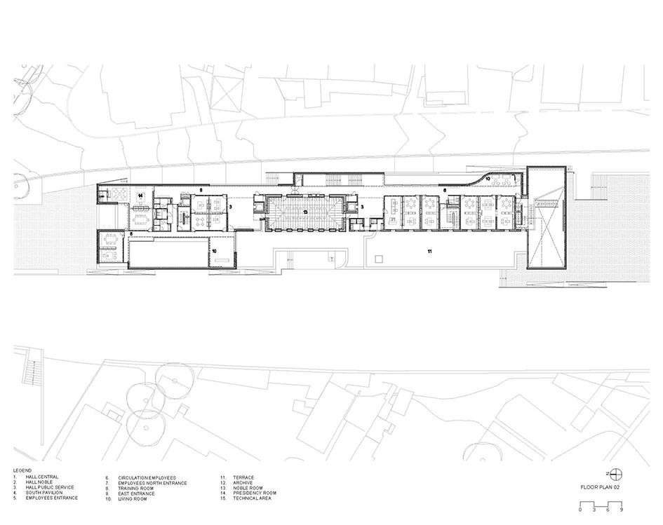 Floor plan drawing showing a linear arrangement of rooms with a central courtyard and stair cores