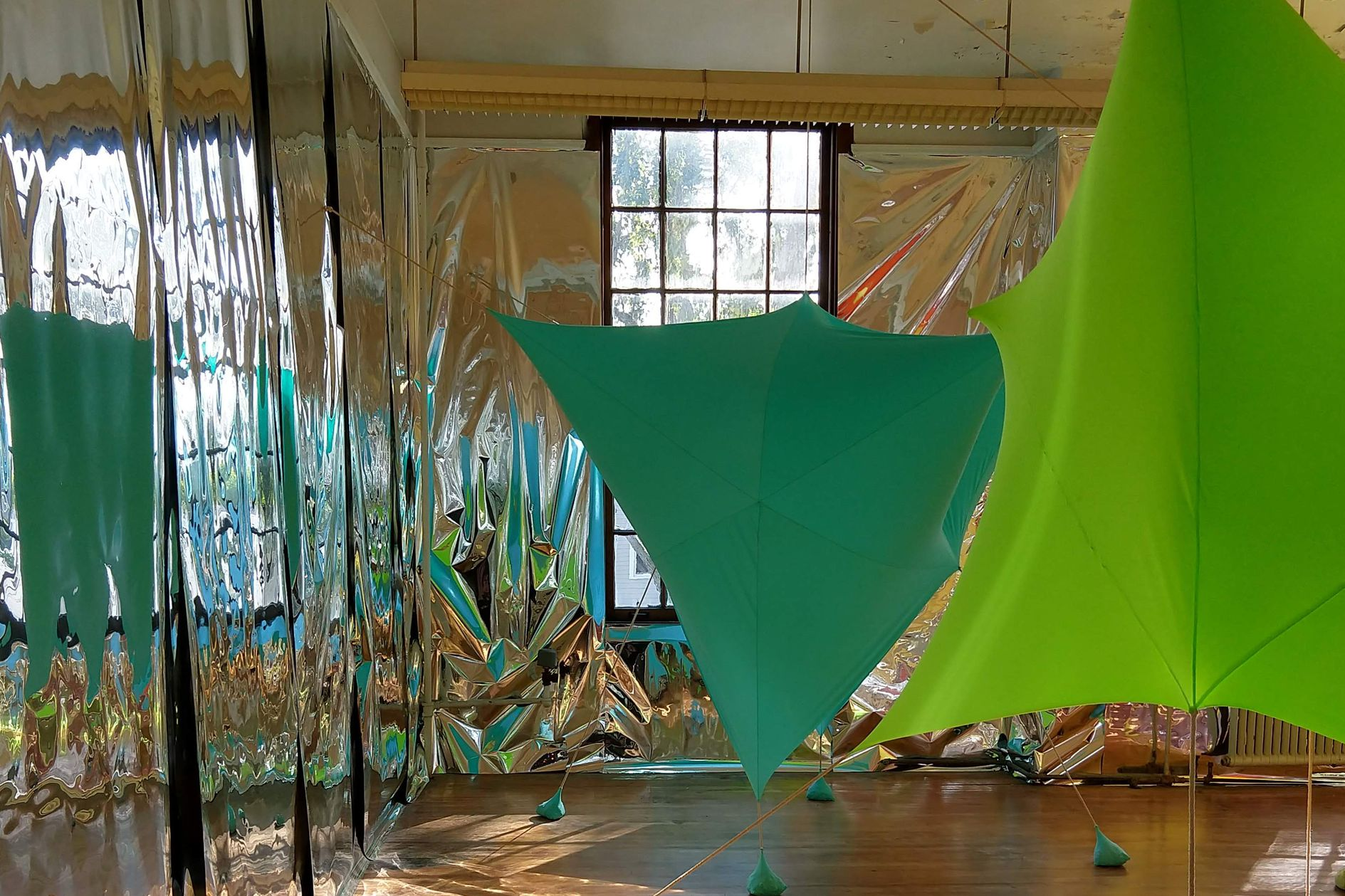 Reflective surfaces and vibrant forms define Color Constellation, an immersive parametric architecture installation by Virginia Melnyk.