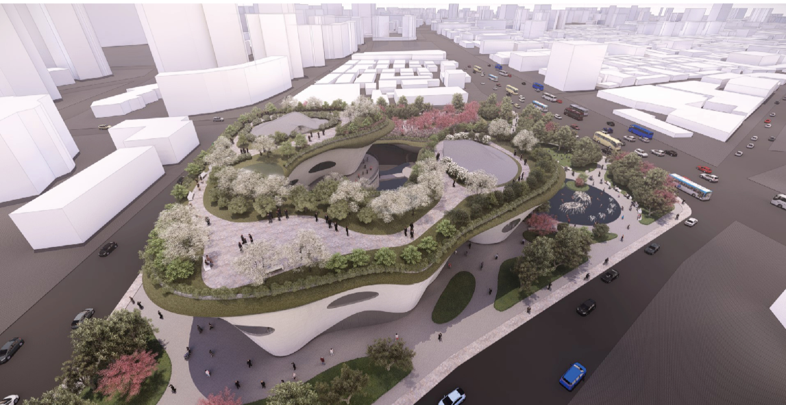 Aerial view of the lush burial gardens blending with urban fabric, redefining cemetery topography.