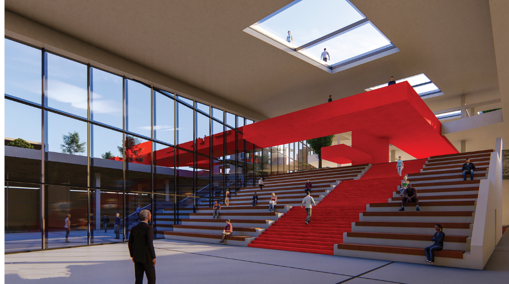A vibrant red staircase anchors the amphitheater, encouraging communal gathering and visual flow under a sunlit atrium.