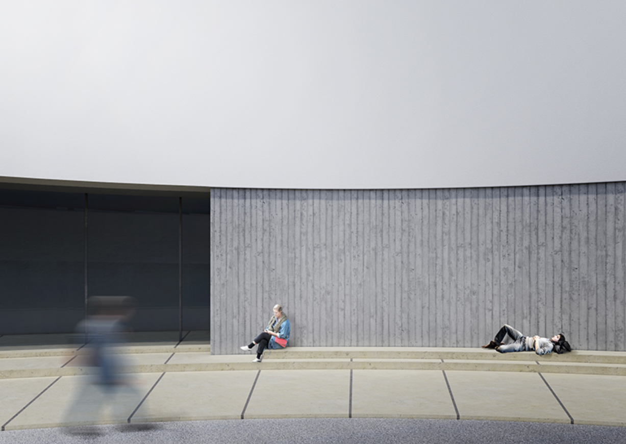 Visitors resting beneath the hovering form in the quiet courtyard.