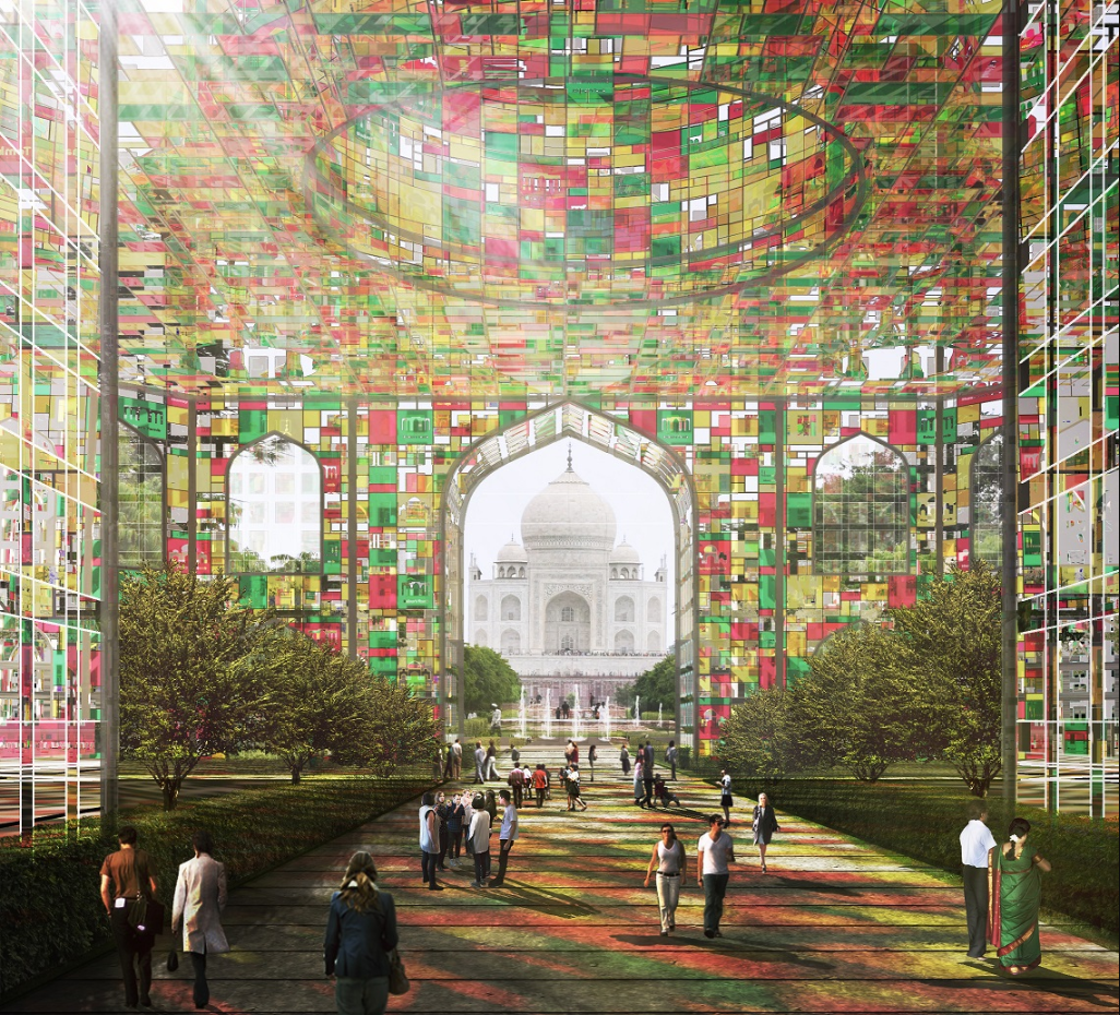 Visitors walk beneath colored glass panels representing the preservation state of Mughal monuments, inside the “Time Capsule.”