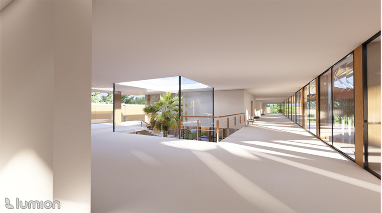 Natural light filters through wide openings, illuminating open circulation spaces and fostering a calm, contemplative ambiance.