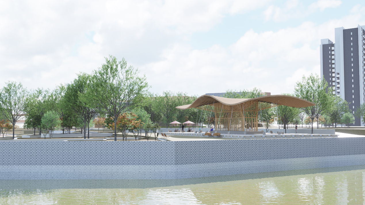 Aerial view demonstrating how the bamboo pavilion blends with greenery and water, emphasizing its sustainable design approach.