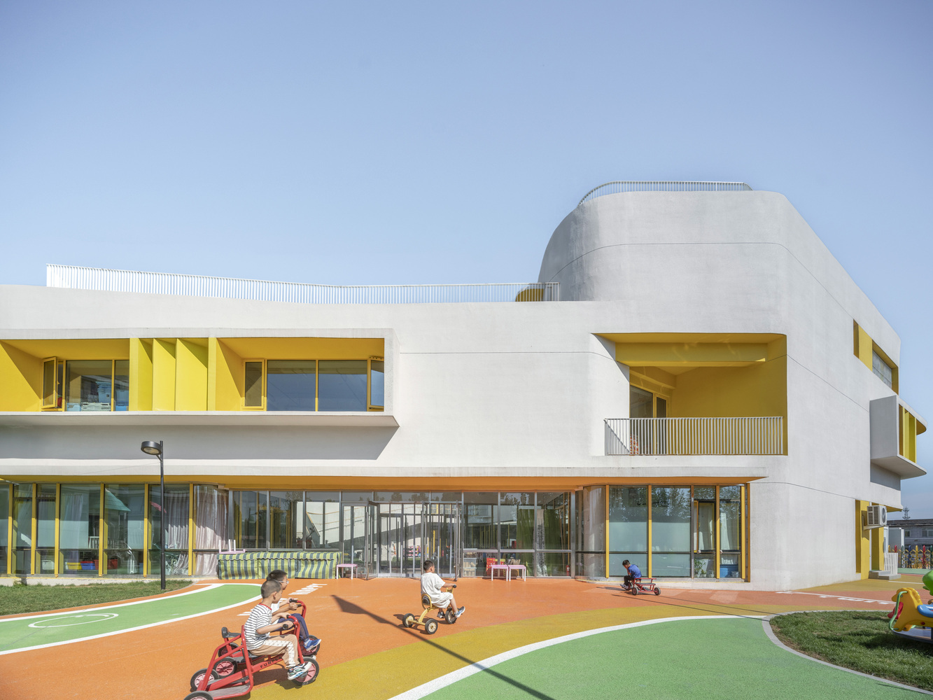 Beijing Gaoliying Kindergarten — a roofscape that becomes the school's primary landscape