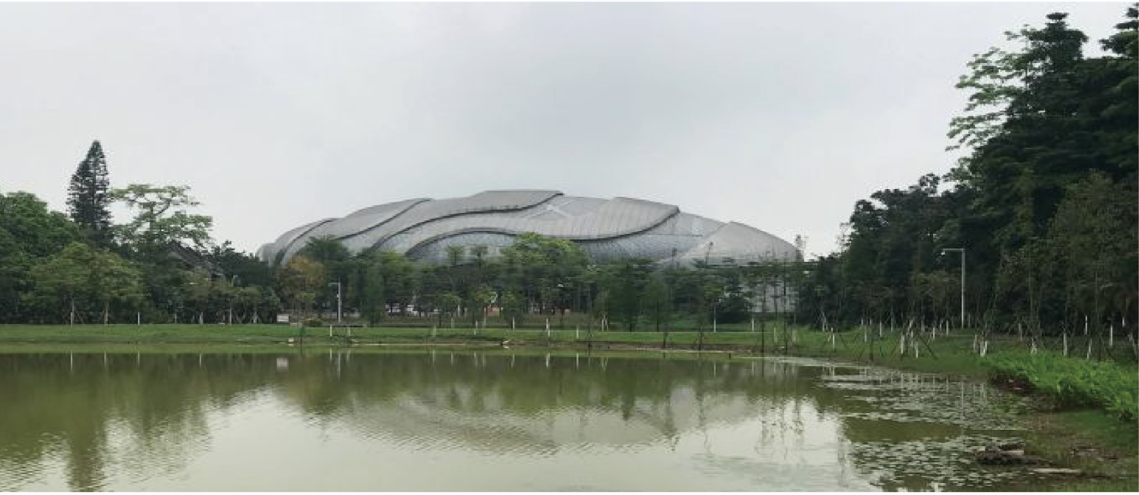 The serene lakefront view at Guangzhou University Town — the site envisioned for the “Life Stage” project.