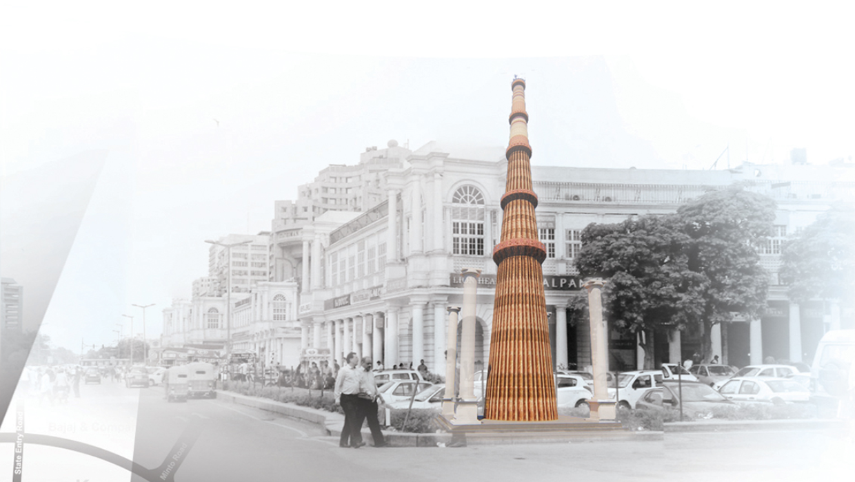 Tall ribbed timber column standing in front of a neoclassical building facade with pedestrians