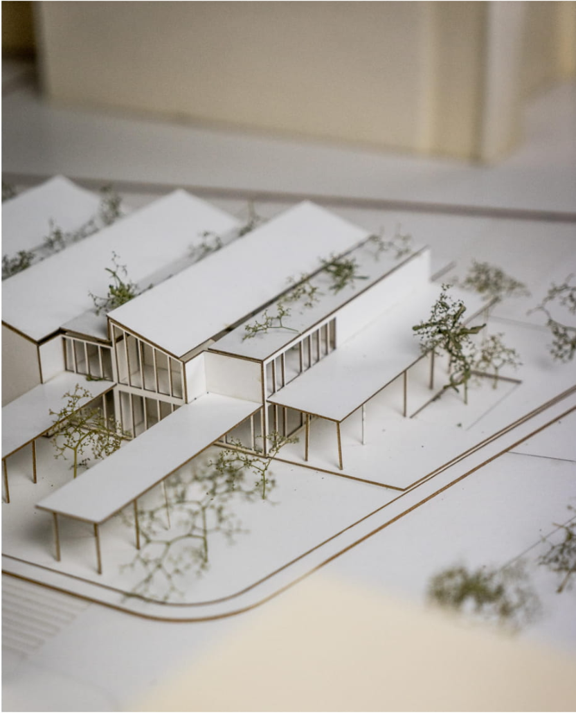 Axonometric model view revealing the internal courtyards and linear circulation strategy enhancing natural ventilation.