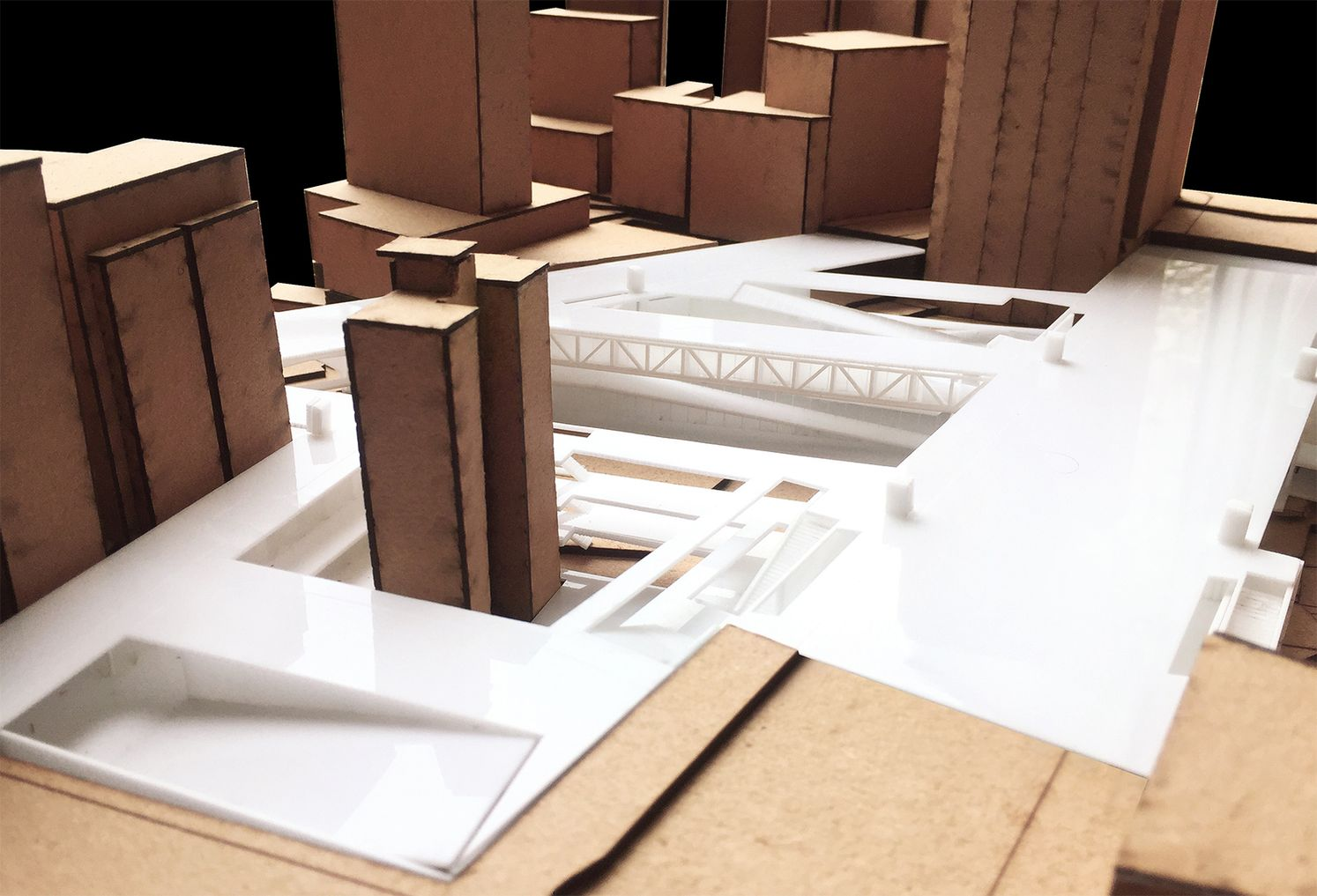 Physical model highlighting circulation bridges and layered public platforms