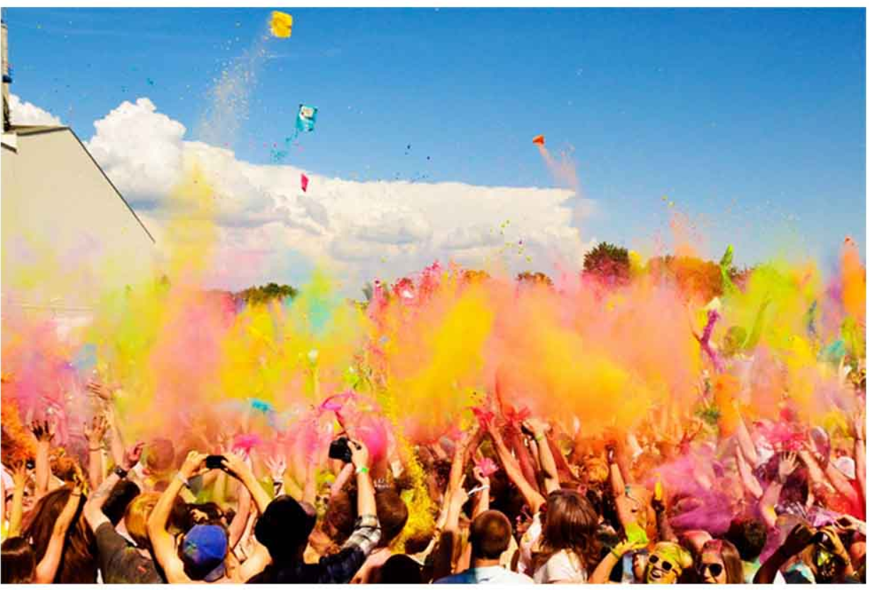 Celebration as spatial catalyst—where color, crowd, and moment temporarily redefine place and identity.