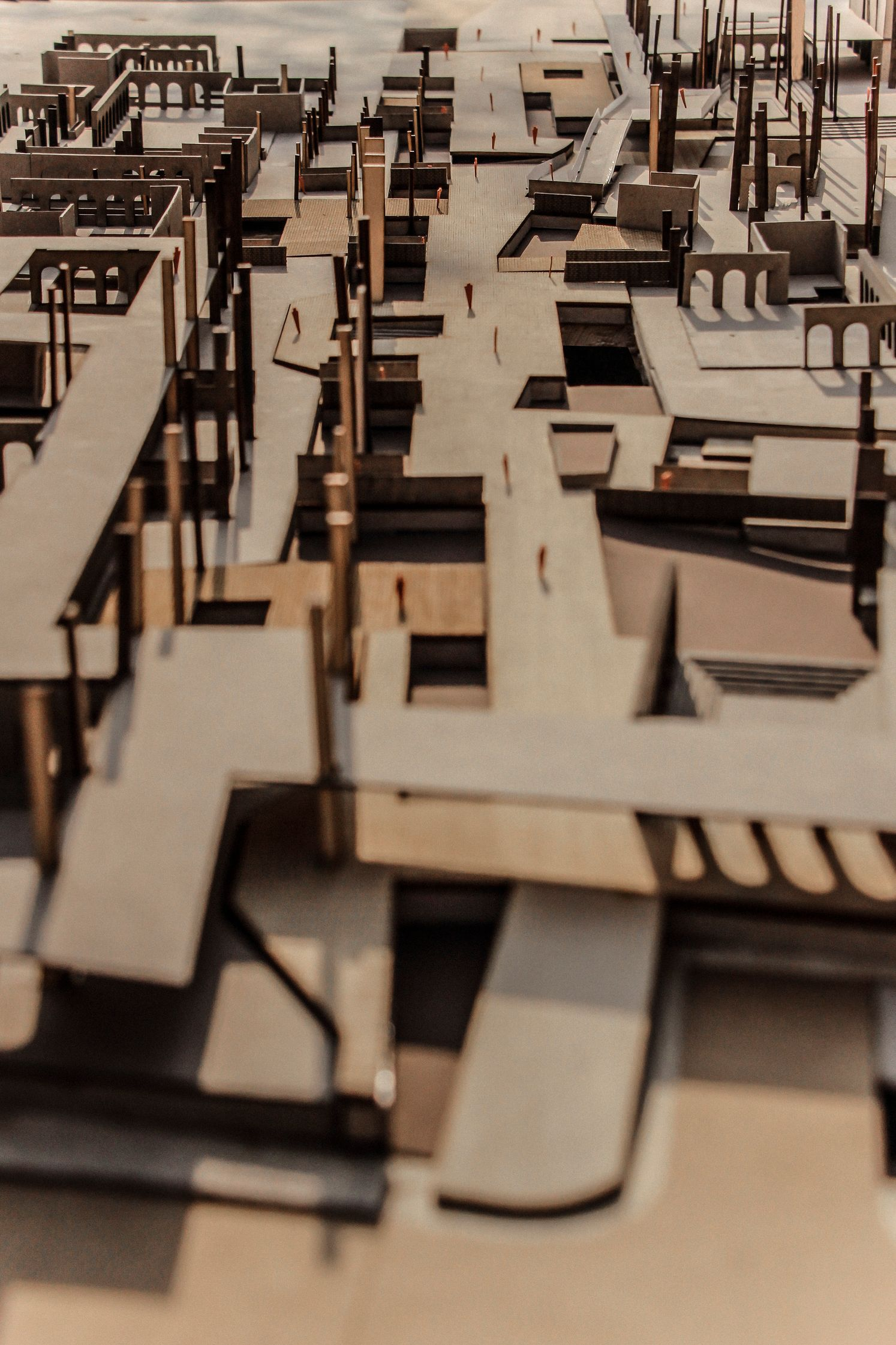 Physical model exploring porous urban fabric and interconnected public realms at the neighborhood scale.