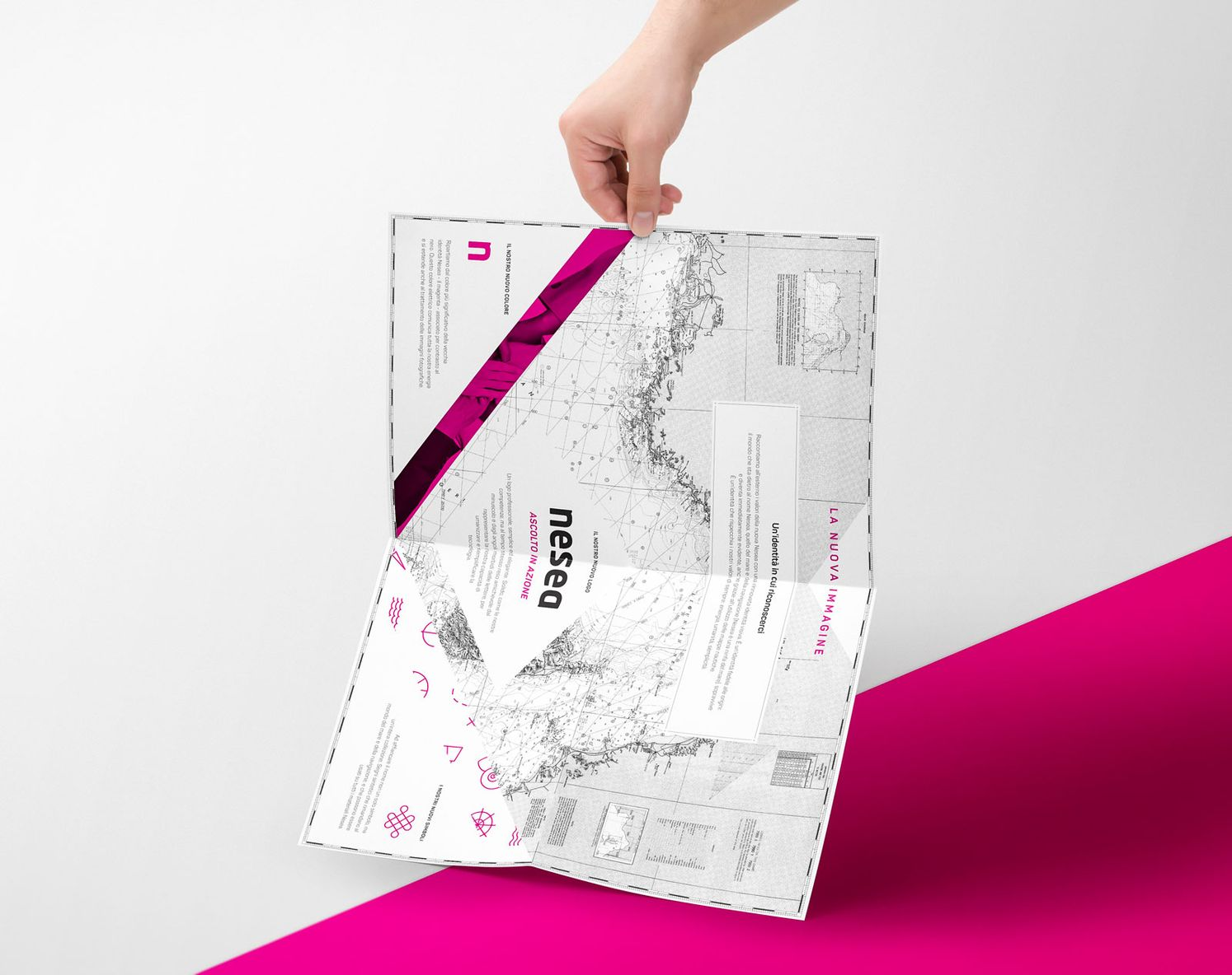 Brand identity unfolds through print design, translating innovation consulting into a tangible visual language.