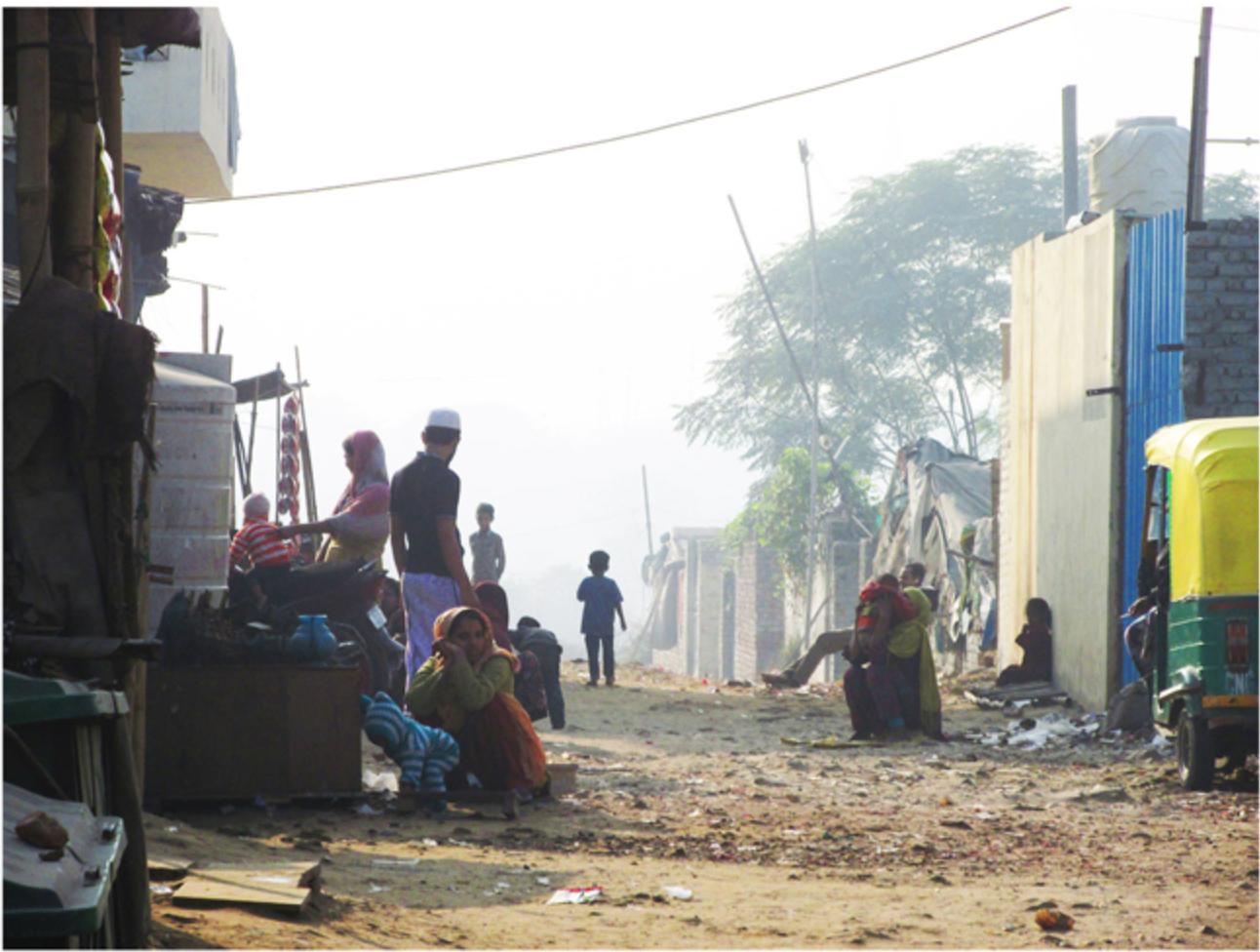 Informal refugee settlement in Delhi, highlighting dense living conditions and lack of basic infrastructure.